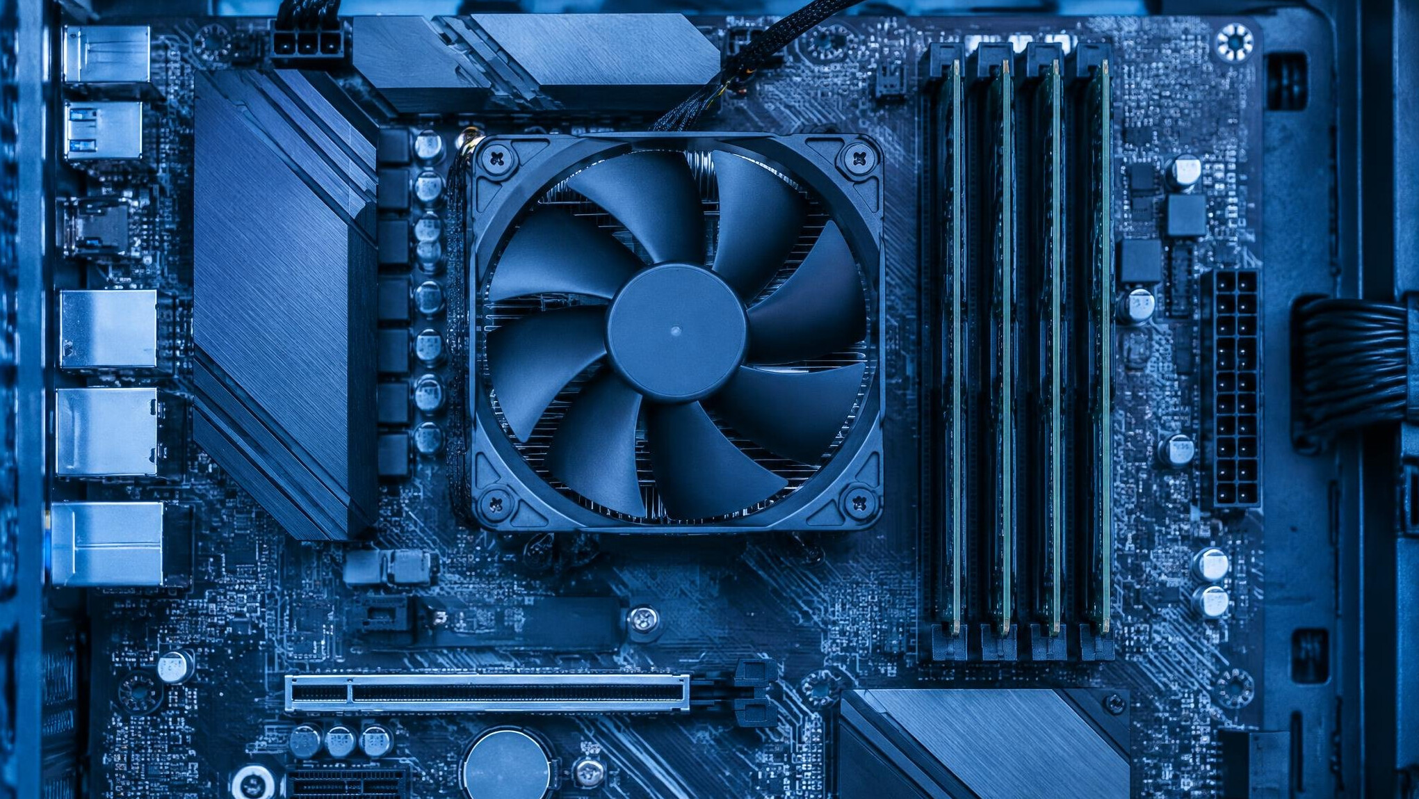 Computer motherboard and components being cleaned